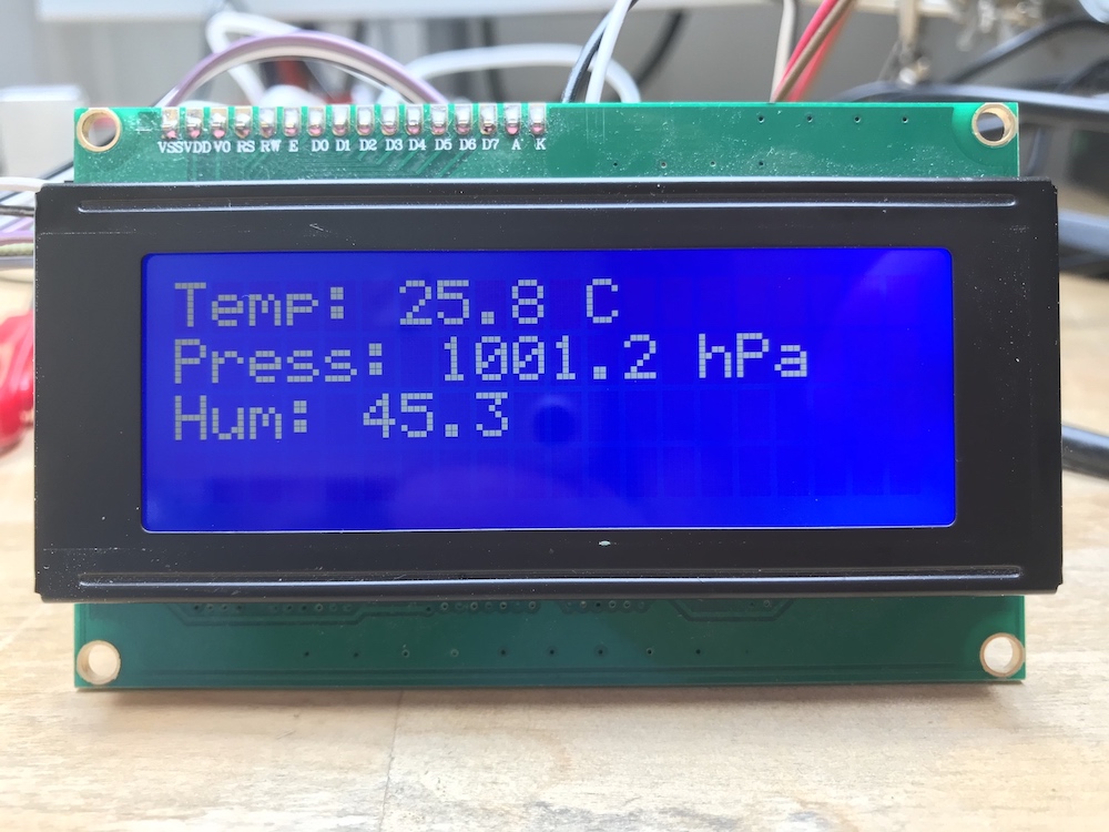 LCD display showing climate data