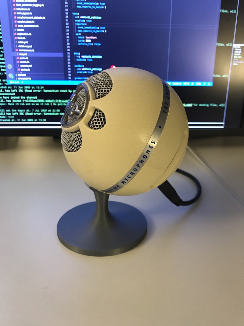 Blue snowball microphone on the new stand