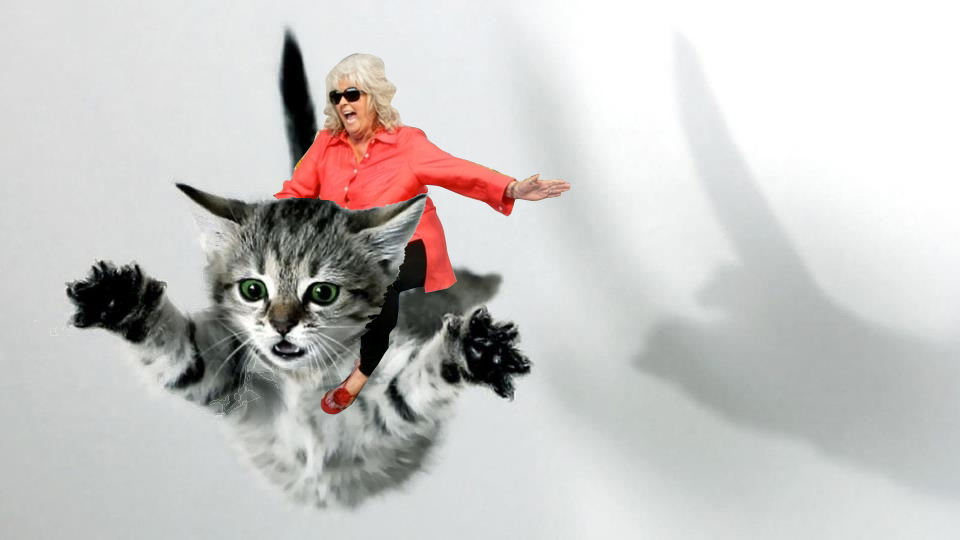 Paula deen riding a kitten