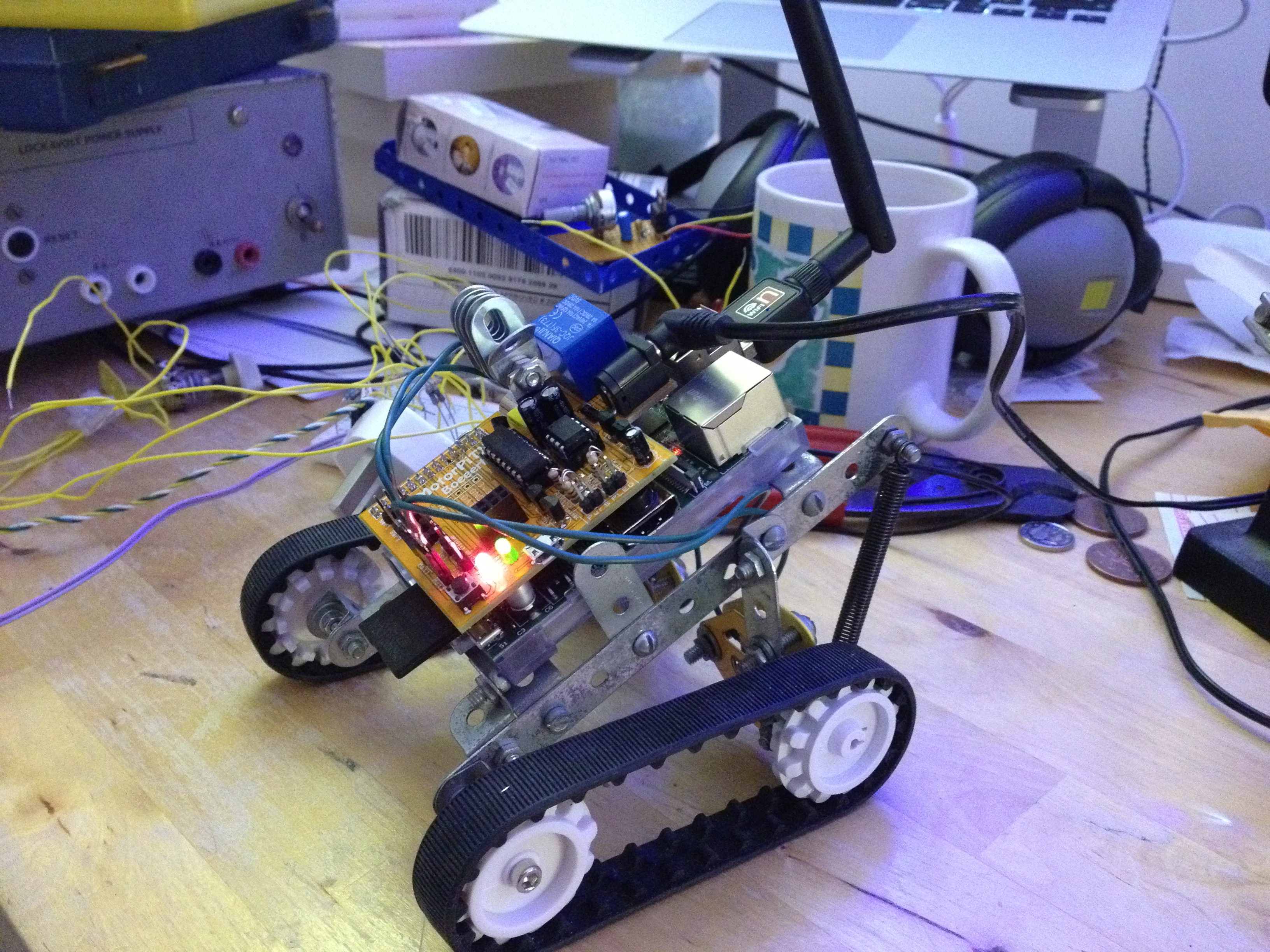 A prototype robot with a MotorPiTX board on top of a Raspberry Pi