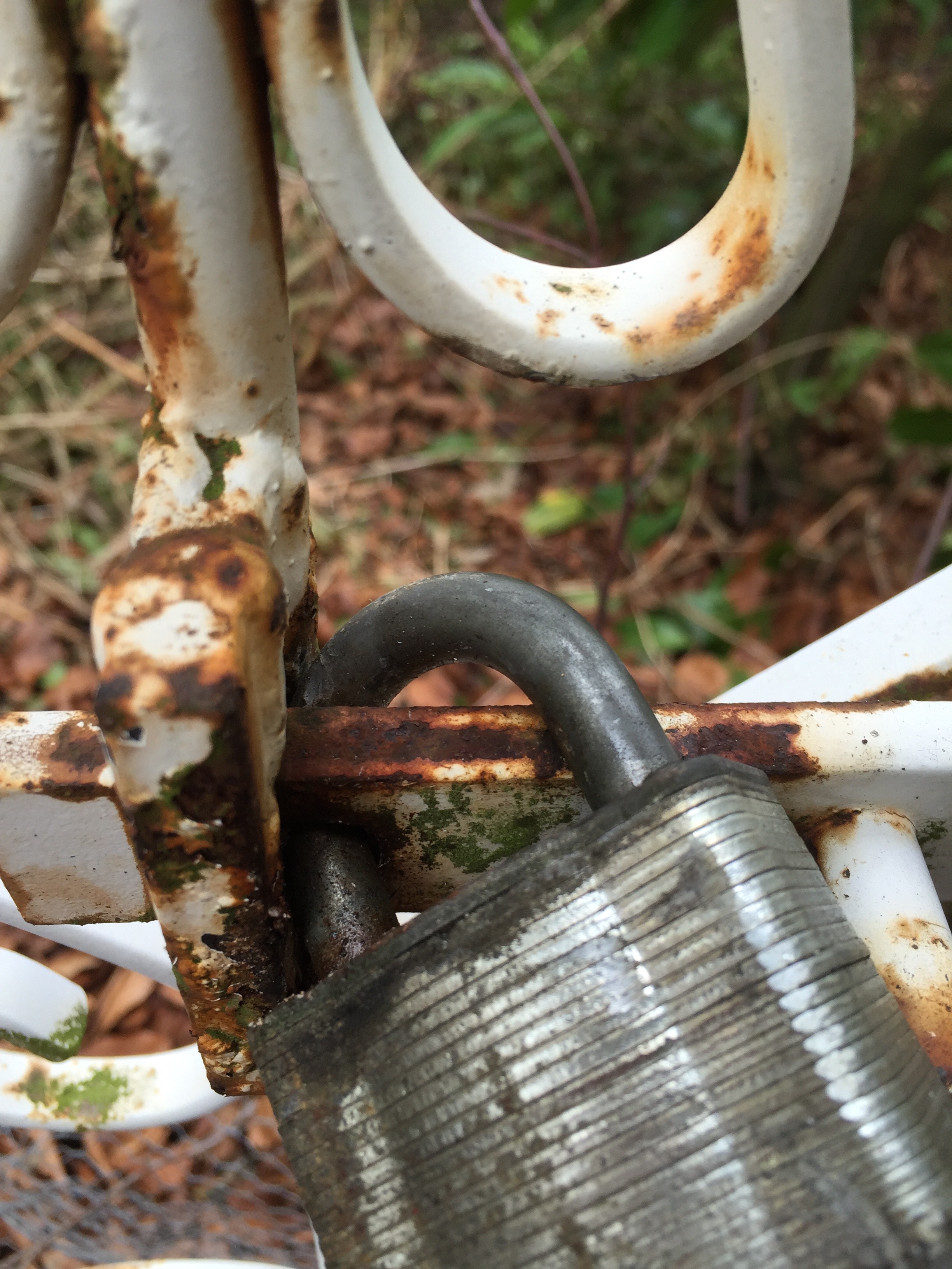 CLoseup of a padlock with a Hardened steel U and body of layered steel plates